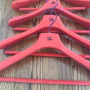 Isaia Napoli Vibrant Coral Wooden Hangers